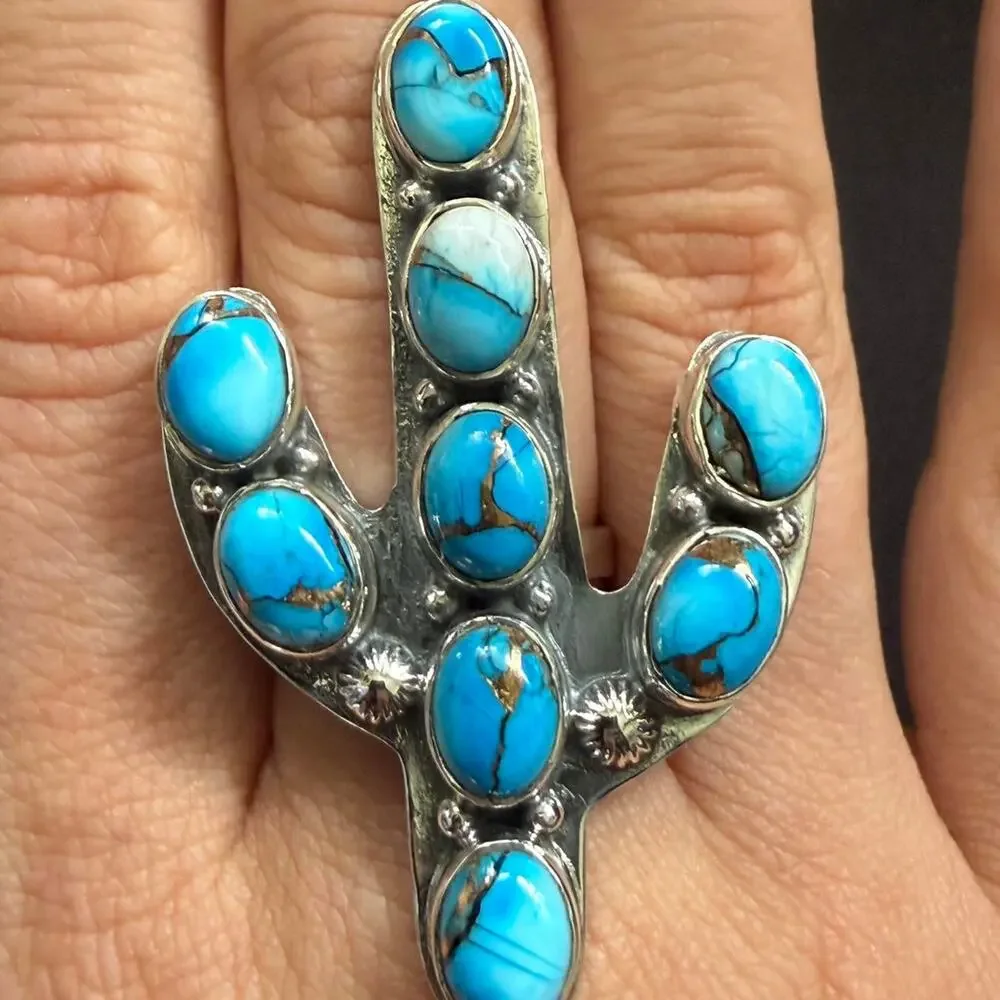 Sterling silver handmade turquoise catches ring adjustable size